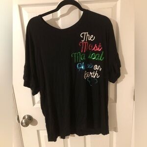 Black flutter sleeve w/ sequins. Walt Disney World exclusive.Smoke free home.